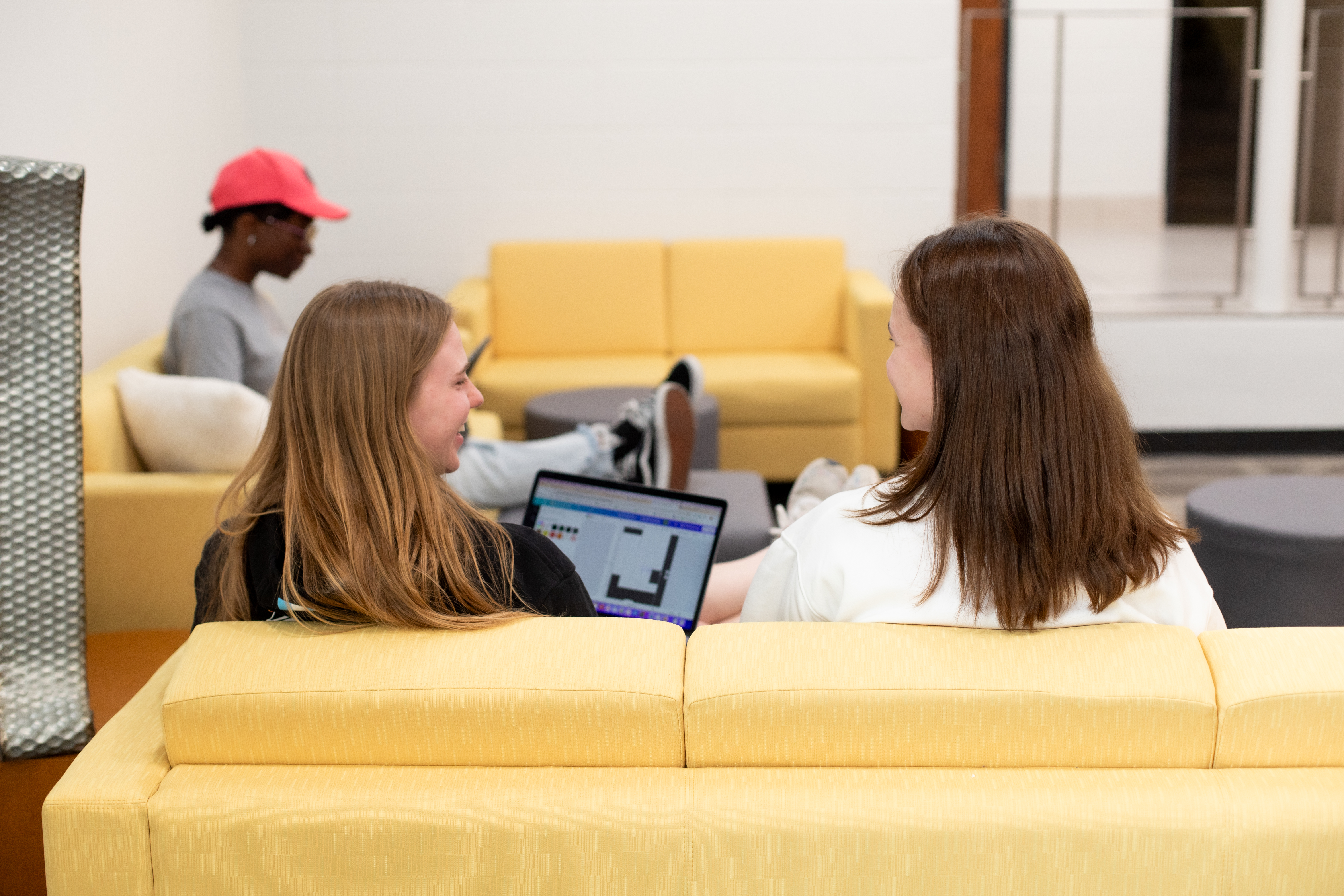Students in Leslie dorm lobby
